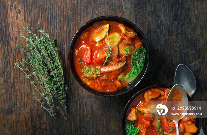 Two bowl of soup minestrone with seasonal vegetables. Italian food