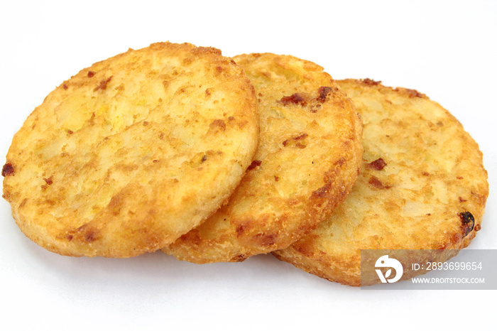 several rösti cooked on a white background