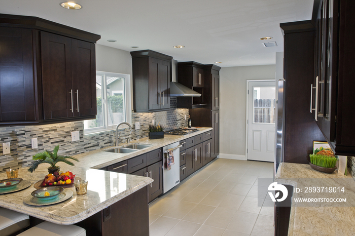 Interior of kitchen in two story house; California; United States of America