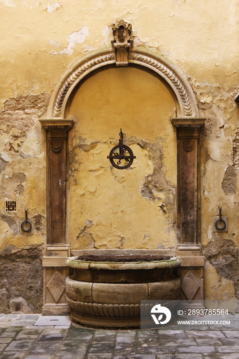 Medieval Well with Arched Detail