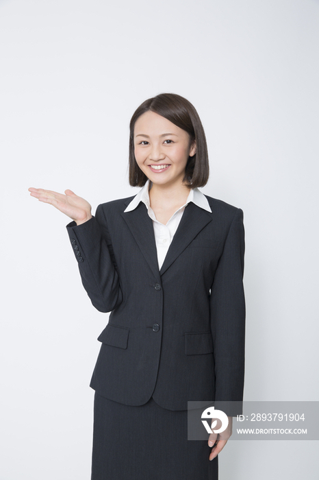 Businesswoman with Hand Palm up