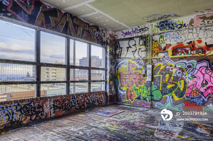 Graffiti adorns walls of a parking garage opened to urban art