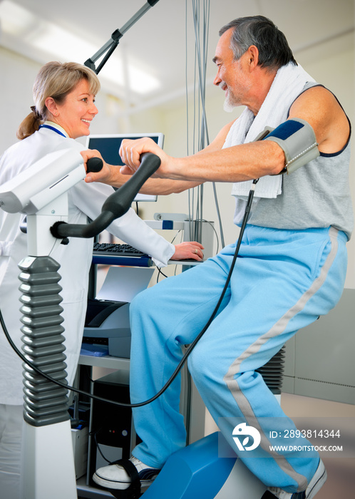 Patient is being observed by doctor - EKG test