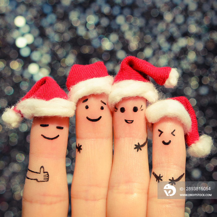 Finger art of friends celebrates Christmas. The concept of a group of people laughing in new year ha