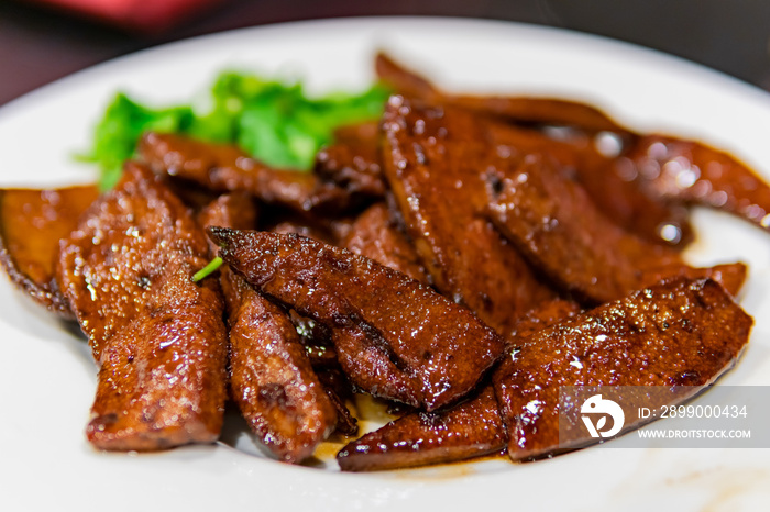 Close up shot of a dish of fried Pork Liver