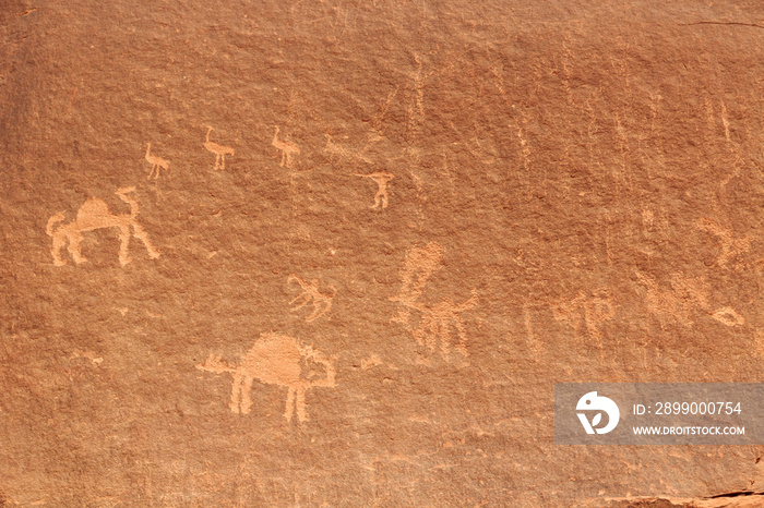 Thamudic and Nabataean petroglyphs and inscriptions on mountain in Wadi Rum desert, Jordan