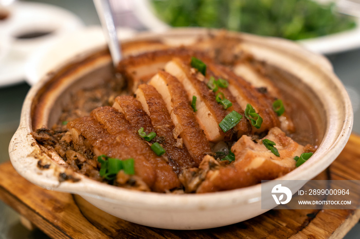 Chinese cuisine pork belly with pickled vegetables cooked in claypot