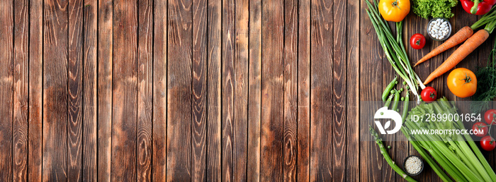 Various healthy products on wooden background