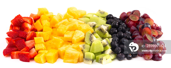 Lines of Rainbow Colored Fruit Isolated on White Background