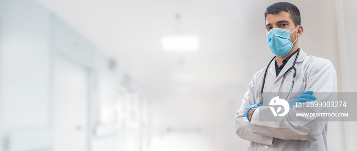 Coronavirus. Copy Doctors working in the hospitals and fighting the coronavirus. Male doctor in the protective suit and mask looking for a cure for the disease.