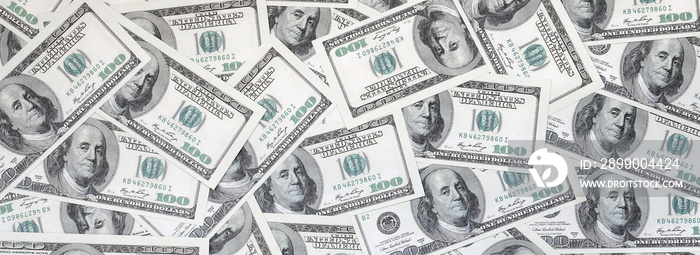 A pattern of many dollar bills. Background image