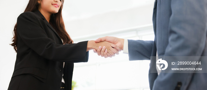 Business deal agreement concept, Businessman and businesswoman handshake commit on business contract deal