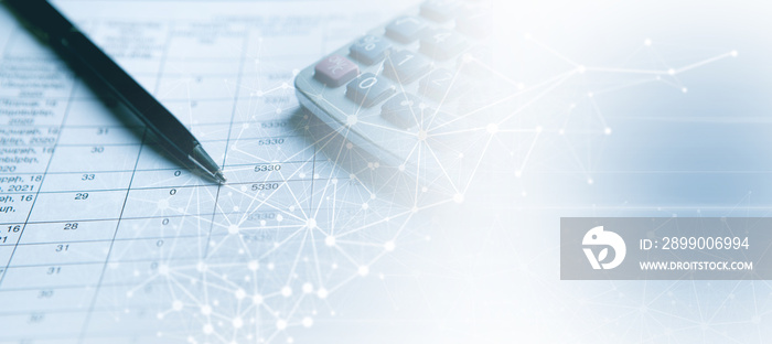 Close up calculator and financial report - accounting concept