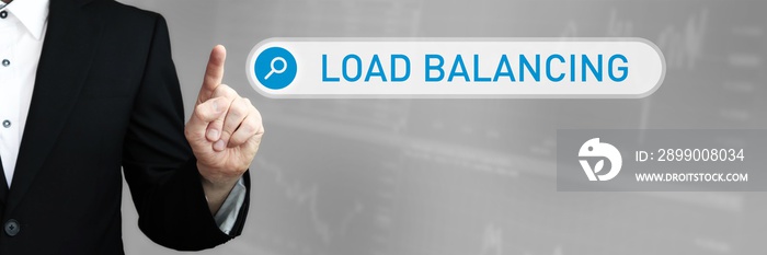 Load Balancing. Man in a suit points a finger at a search box. The word Load Balancing is in the search. Symbol for business, finance, statistics, analysis, economy