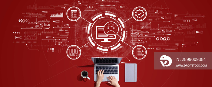 Document management system concept with person working with a laptop