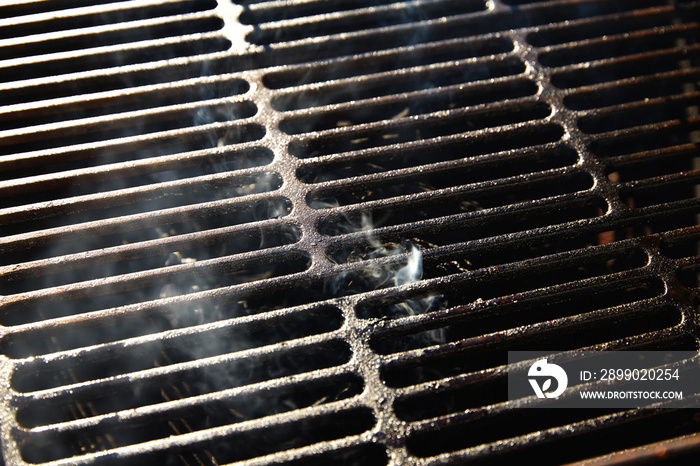 Barbecue grill texture with coal smoke