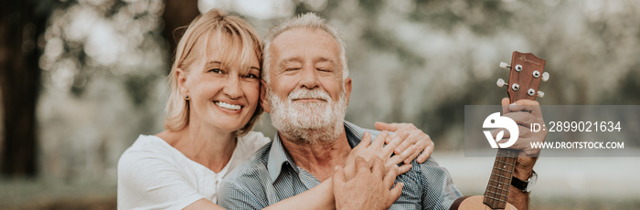 Lifestyle senior couple happy and relaxed . Good Healthy elderly in park nature. Group of Senior Ret