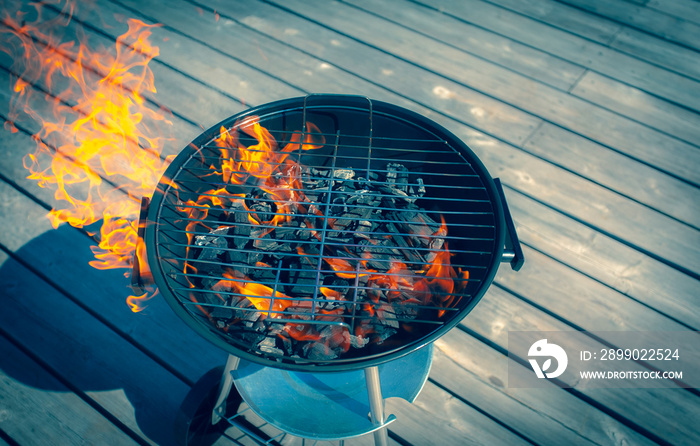 Charcoal grill on the pier. Sotkamo, Finland.