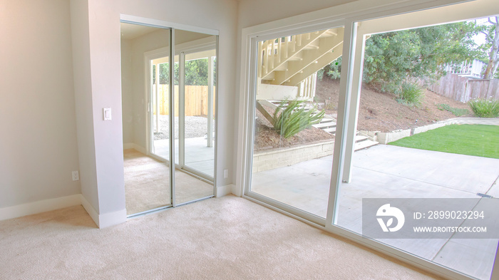 Panorama frame Empty bedroom with sliding glass doors