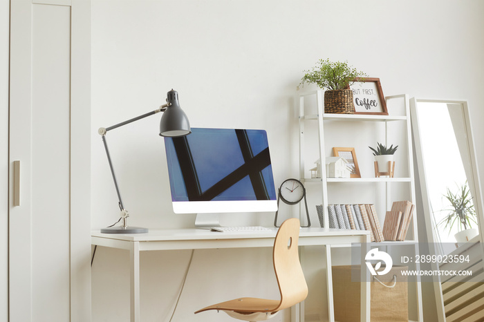 White Background image of empty home office workplace with wooden chair and modern computer on white