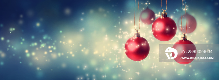 Collection of Christmas baubles in snowy night