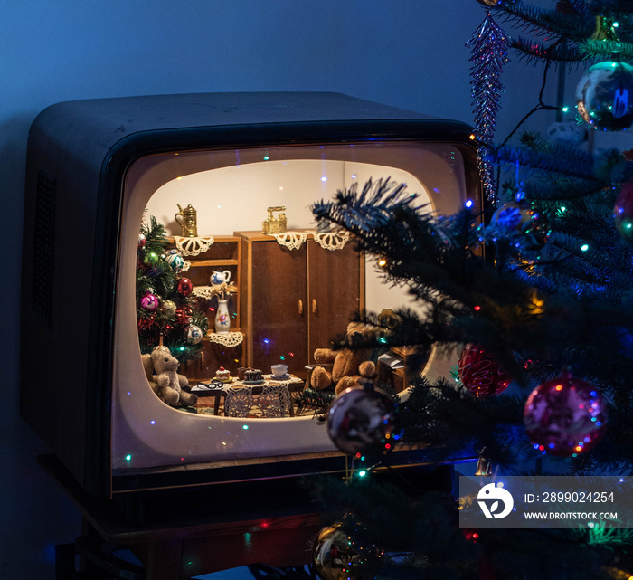 Christmas decoration - an old television rebuilt as a doll house, mid century modern interior, vinta