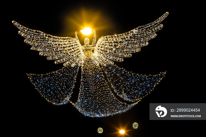 Christmas lighted decoration of angel hanging on Lviv street