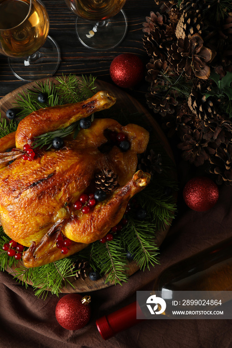 Concept of Christmas roast turkey on wooden table