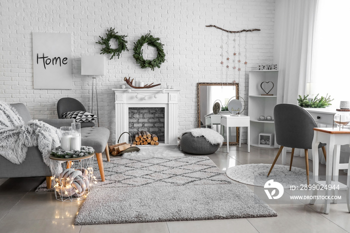 Stylish interior of living room with Christmas decor