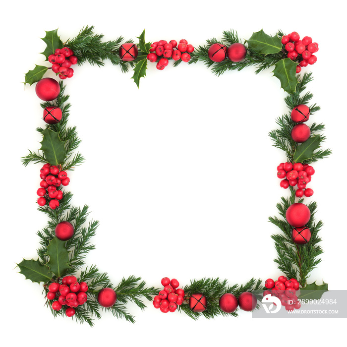 Christmas and winter background border with red bauble ball and bell decorations, holly and juniper 