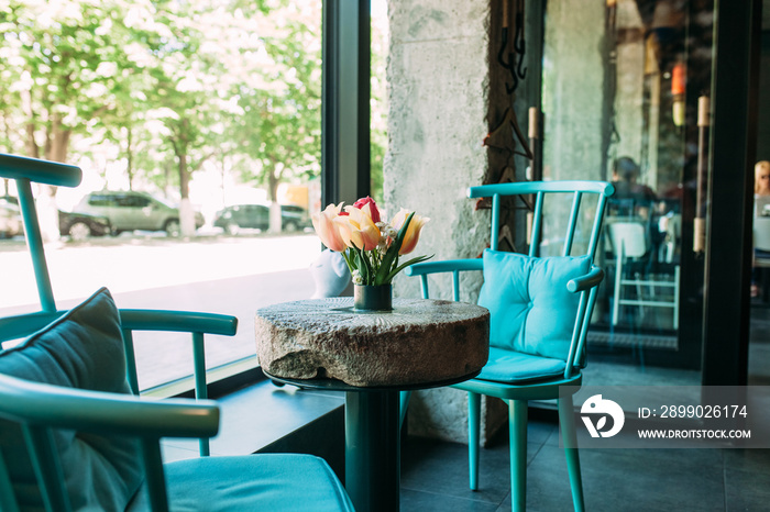 photo cafe inside, decorative chairs and tables, beautiful view