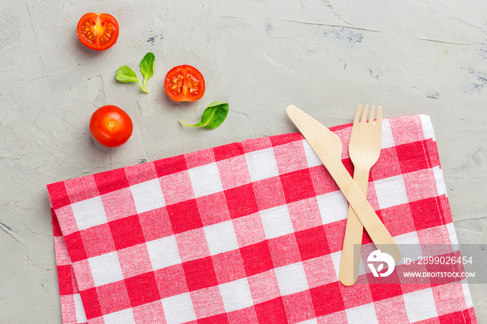 Abstract food background with napkin and wooden cutlery. Napkin close up top view mock up for design