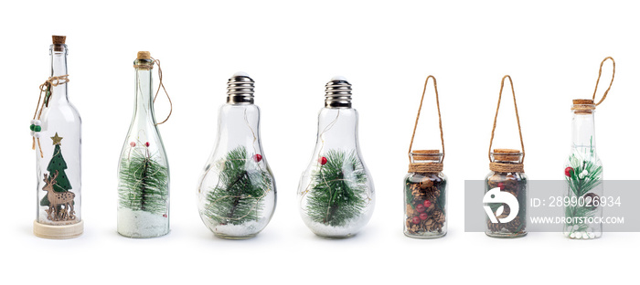 Set of Bottles, Jars and lamp with Christmas tree inside isolated on white background, Clipping path