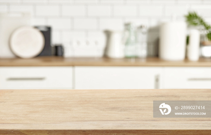 wooden table and defocused kitchen background