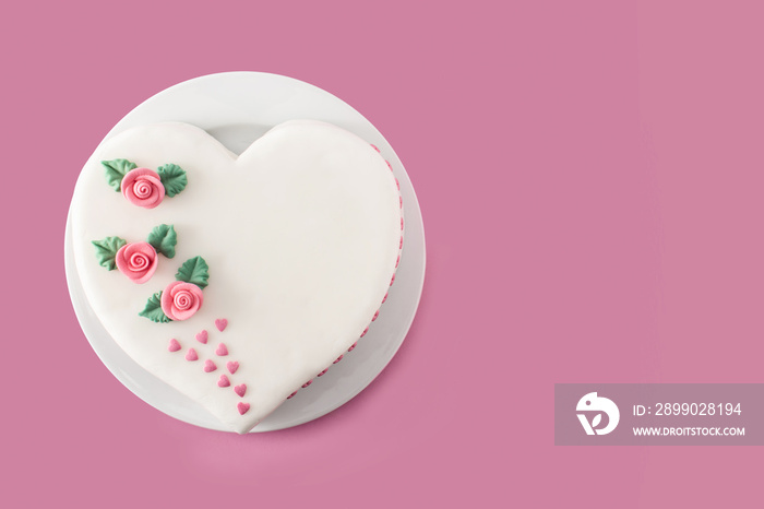 Heart cake for St. Valentines Day, Mothers Day, or Birthday, decorated with roses and pink sugar h