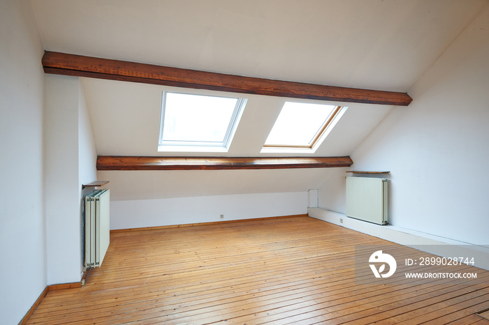 Interior attic windows and hardwood floor