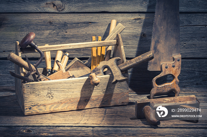 Closeup of joinery tool box in rustic wooden shed