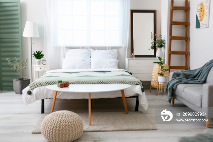 Interior of modern stylish bedroom, blurred view