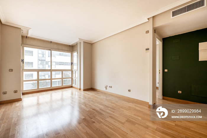 living room with large window, ducted air conditioning and oak parquet floors