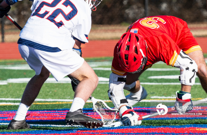 High school lacrosse faceoff