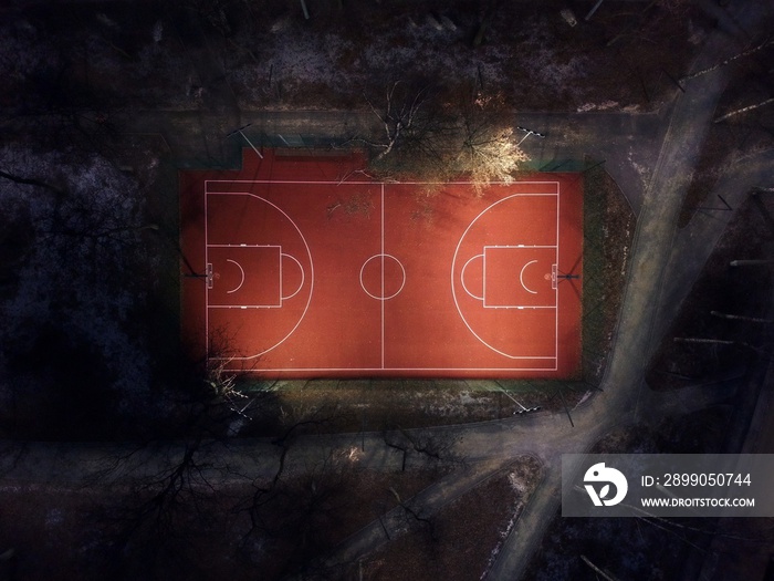 aerial view outdoor public basketball court at night