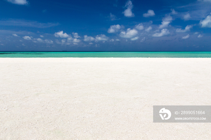 Beautiful beach with white sand. Tropical sea with cloudy blue sky . Amazing beach landscape