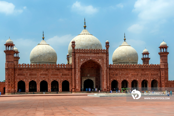 beautiful mosque in blue sky and white clouds, The Badshahi Mosque is a Mughal-era congregational mosque in Lahore, capital of the Pakistani province of Punjab, Pakistan