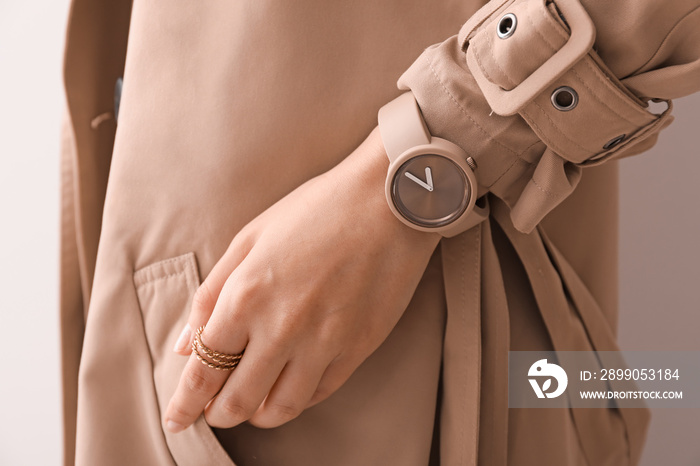 Woman with stylish wrist watch, closeup