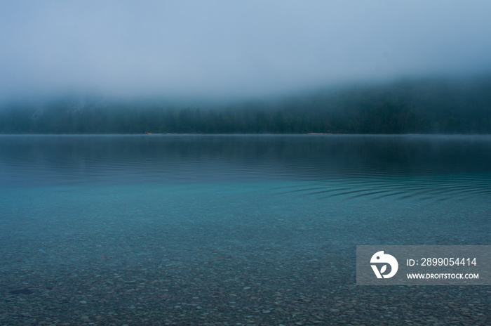 misty morning fog on the lake in Bohinj, Slovenia