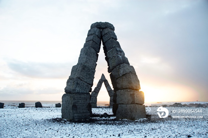 Panorama winter view of monument arches basalt blocks art stone construction Arctic Henge in Raufarhofn North Iceland