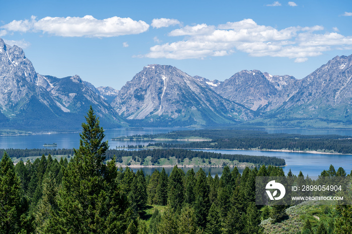 The Teton mountain range rises above Jackson Lake near Grand Teton National Park near Jackson Hole, Wyoming