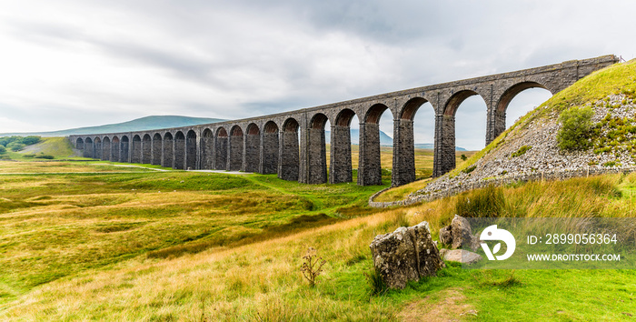 A panorama view of the Ribblehead Viaduct, Yorkshire, UK in summertime