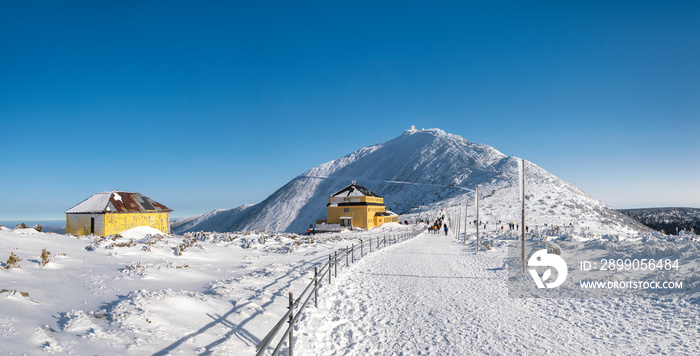 Snezka or Sniezka mountain in winter. View from Kopa mountain in Karkonosze National Park, Sudetes, Poland