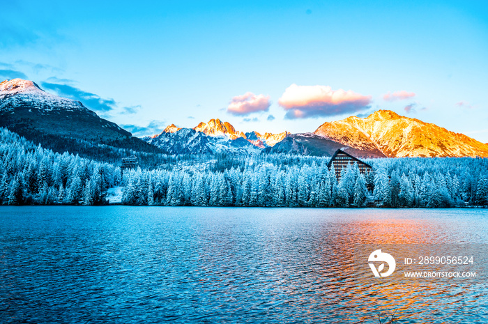 Winter frozen view on Lake Strbske pleso. Strbske lake in High Tatras National Park, Slovakia landscape, Europe.